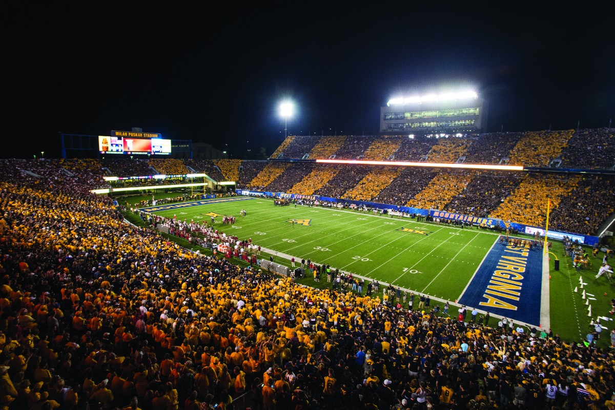 No. 11 Iowa State not expecting a warm welcome in night game against WVU
